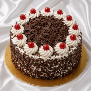Black Forest cake with chocolate sponge,
whipped cream layers, cherries and chocolate shavings