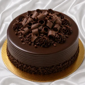 Premium chocolate truffle cake with dark
  chocolate ganache and truffle curls