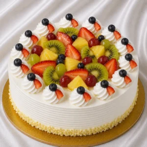 Fresh fruit cake with whipped cream and
  colorful strawberry, kiwi and berry pieces