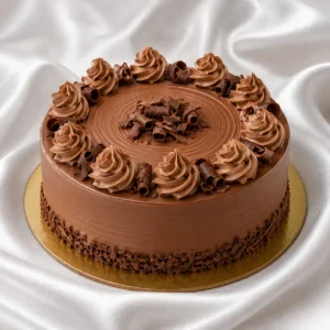 Milk chocolate truffle cake with creamy
  ganache and milk chocolate curls