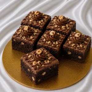 Fudgy Nutella hazelnut brownies with
  roasted hazelnuts and chocolate hazelnut drizzle