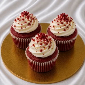 Set of red velvet cupcakes with white
cream cheese frosting and red velvet crumbs